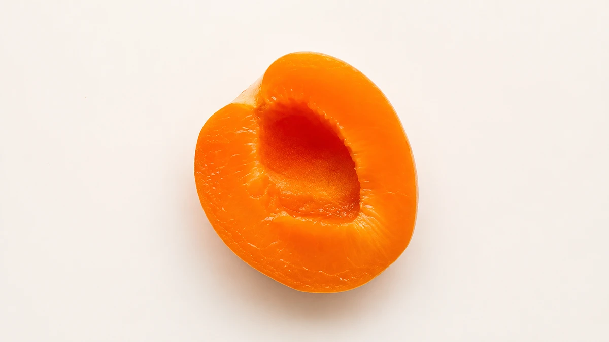 Apricot for babies (6 months old): Large stoned half or wedge, skin on